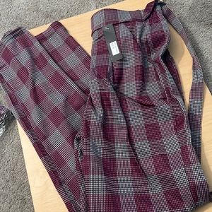 Brand New tapered legged plaid trousers.